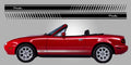 Red Miata car with 'Miata' side stripes on a gray background